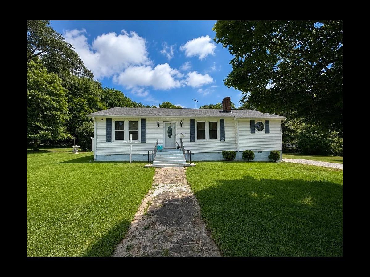 209 Mill Street, Williamston SC, white single-story ranch on a level landscaped lot