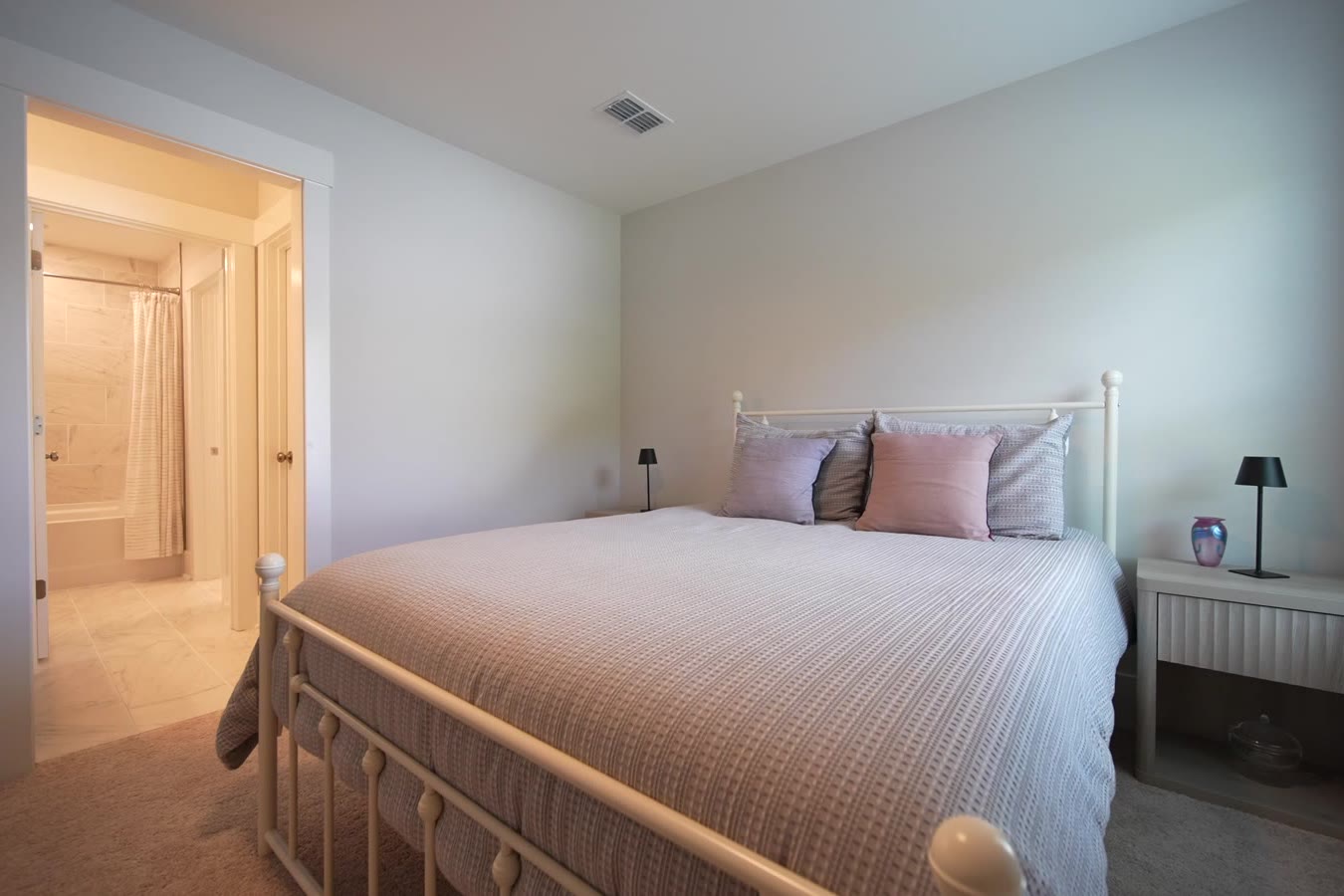 Upstairs bedroom with a guest bed